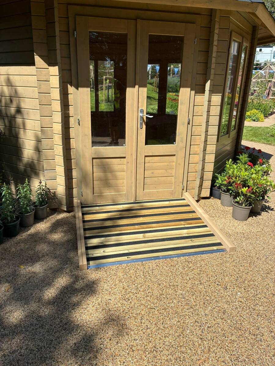 Garden room with timber decking access ramp