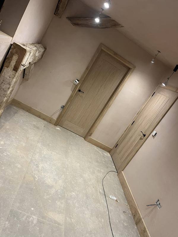 Blackburn Carpentry team working on oak internal doors